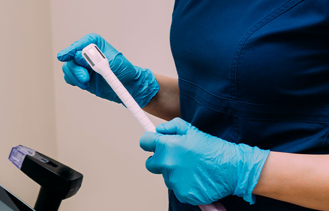Patient receiving vaginal rejuvenation at Skinlastiq Medical Laser Cosmetic Spa in Burlingame